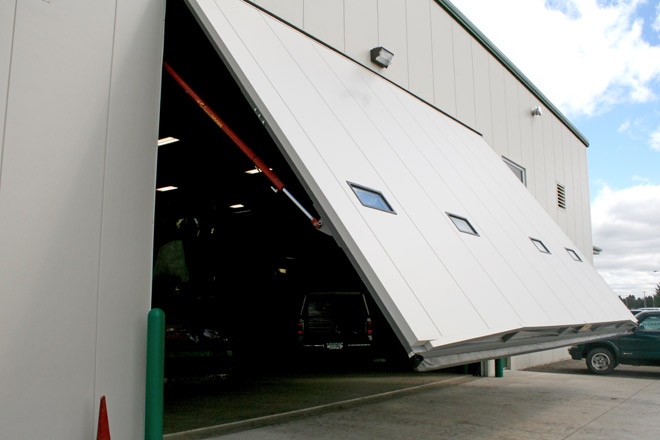 Hydraulic door matches John Deere Dealership's exterior