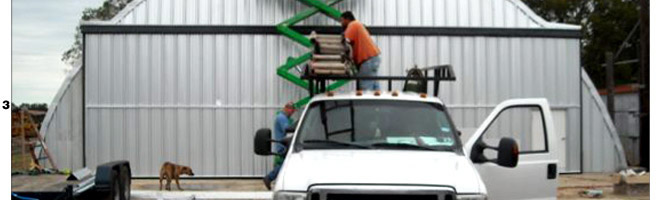 In Texas, Schweiss quonset door get clad in corrugated sheeting