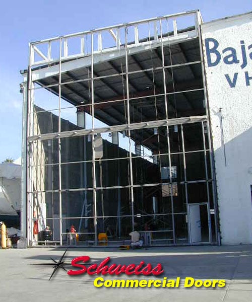 Tall Industrial Bifold Door near Shipbuilding Dock