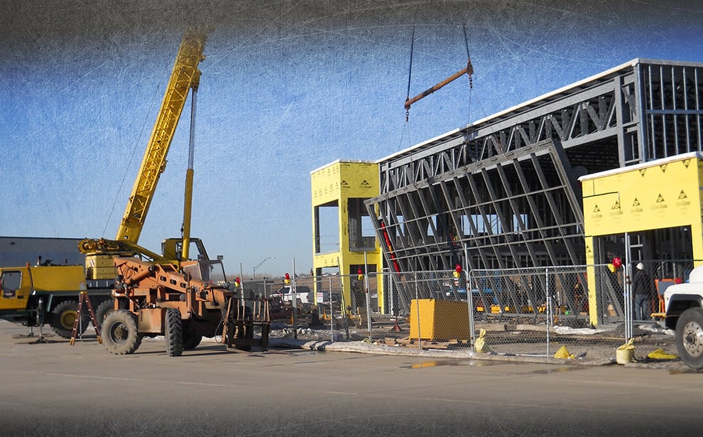 Installation of a hydraulic door from Dakota Doors using crane