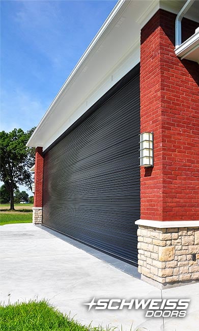 This hangar door is inset from the face of the building