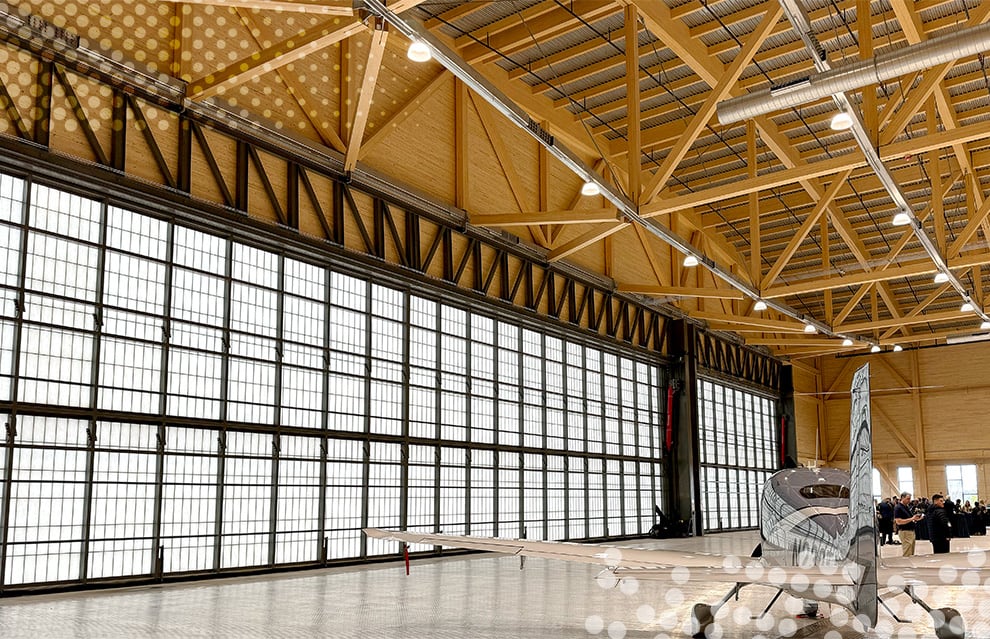 Interior view of 120ft Schweiss hydraulic door on a hangar storing an airplane