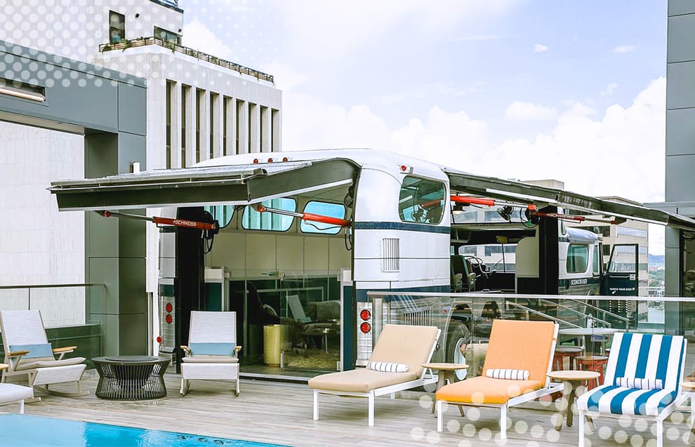 Two Schweiss hydraulic doors installed on Greyhound bus on Bobby Hotel rooftop