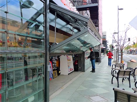 Schweiss bifold door installed on bike transit in California shown half open