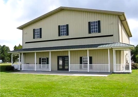 Discrete Schweiss hydraulic door with porch installed on hangar in Florida shown opening