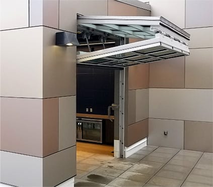 Custom Schweiss glass bifold door installed at Illinois University shown in open position