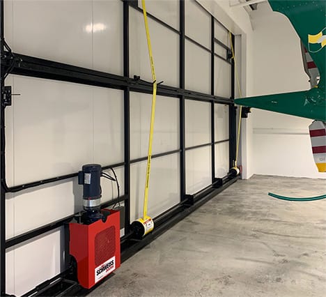 Interior view of Schweiss bifold door fitted on helicopter hangar in Ireland shown closed