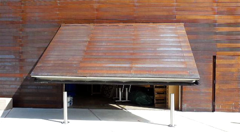 Schweiss hydraulic door fitted on the ground floor of the Louisiana Sports Hall of Fame shown open