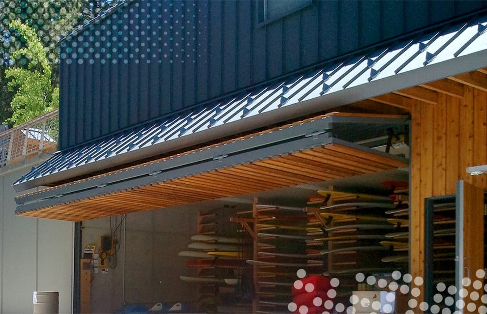 Schweiss bifold door installed on a boathouse on Lake Tahoe in Nevada shown fully open