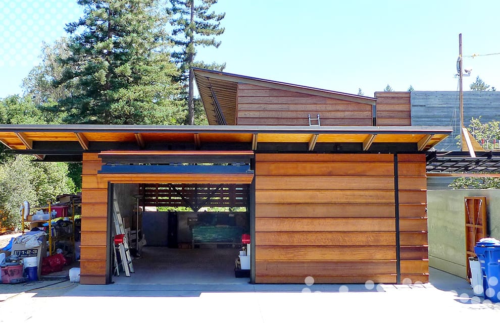 Custom Schweiss bifold door installed on a double garage in Los Altos shown in the open position