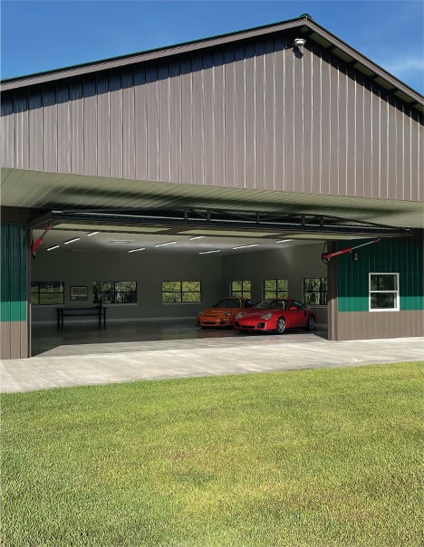 Exterior front view of opened Schweiss hydraulic door fitted on Robert Moore's car barn