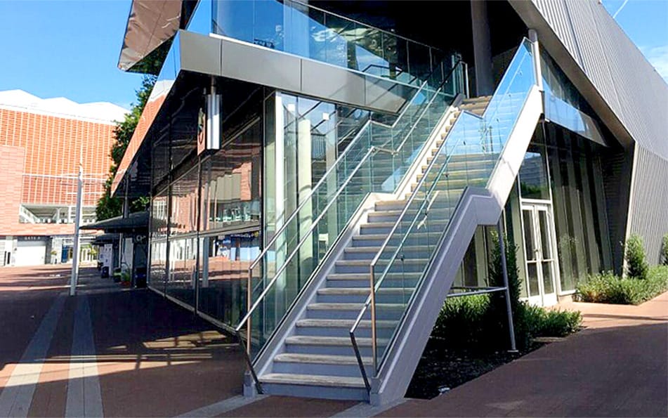 Side view of multiple Schweiss glass bifold doors fitted on Bille Jean King National Tennis Center