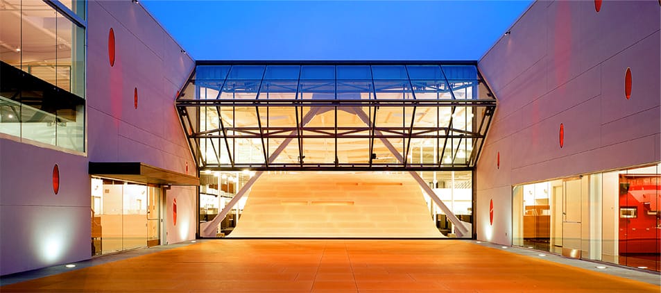 Head-on view of Schweiss bifold door installed on Red Bull HQ shown half-open