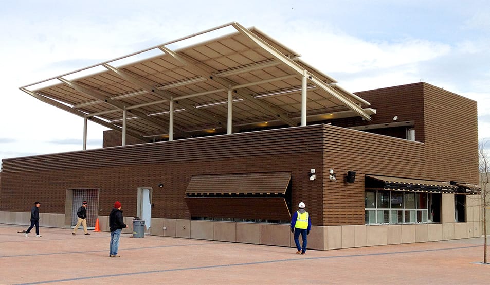 Schweiss bifolds used as window covers on multiple sides of the stage building and concession stand at Riveredge Park in Illinois