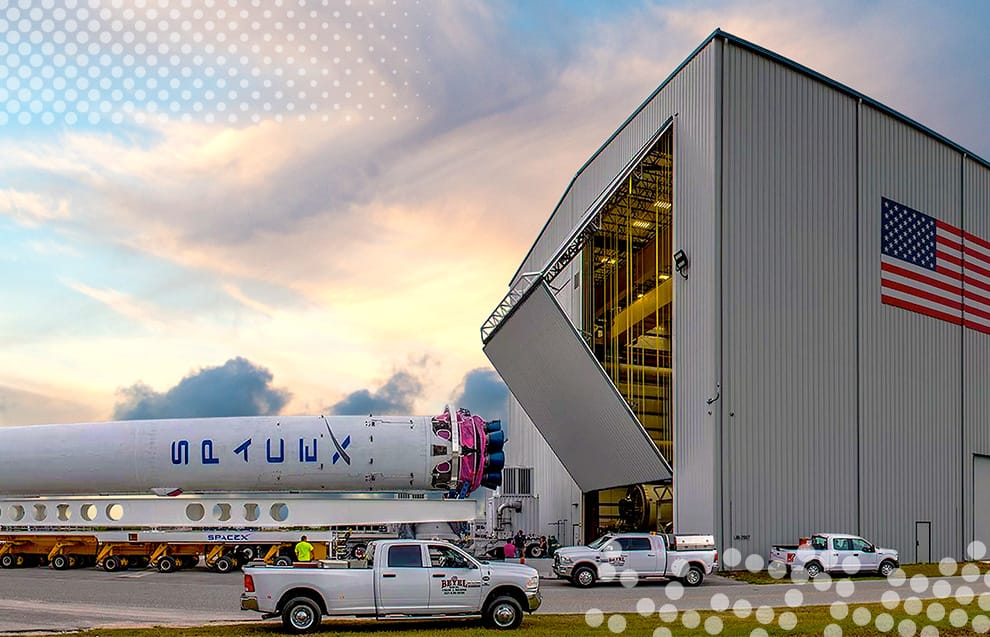 Side view of Schweiss bifold door installed on rocket hangar in Cape Canaveral, Florida