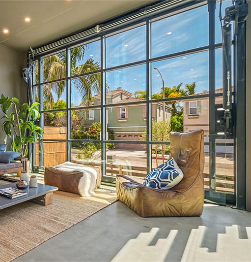 Interior view of Schweiss hydraulic door on Venice Beach Rental Home shown in the closed position