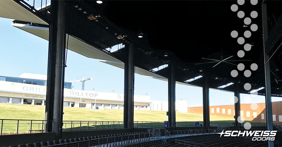 view from inside the arena to the outdoor seating through the seven bifold liftstrap doors all with a 25 ft clear opening