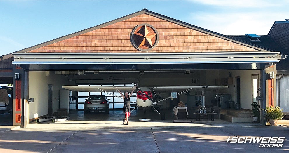 Oregon bifold Liftstraps Hangar Doors with polycarbonate cladding