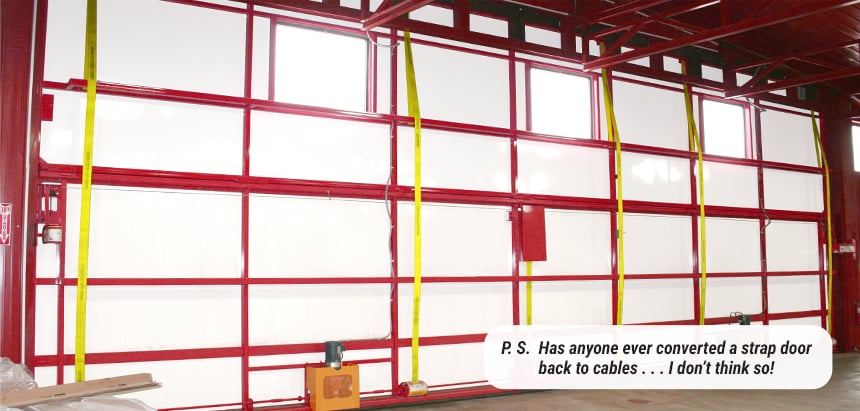 Strap doors do not go back to cables - Schweiss Lift-Strap Door