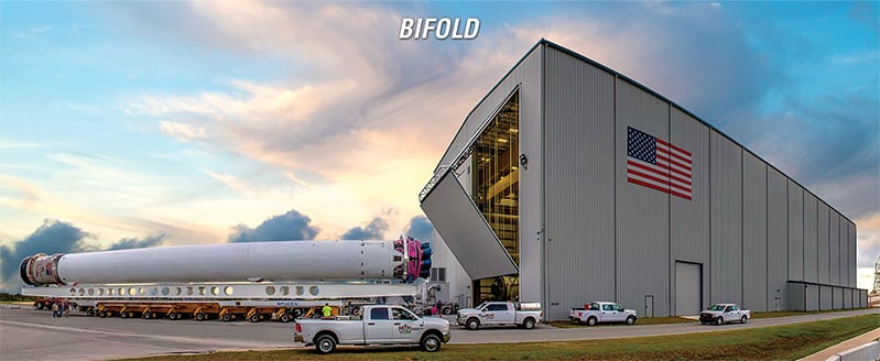 Schweiss bifold door fitted on a rocket hangar shown opening