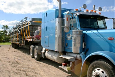 Schweiss door loaded on blue semi truck ready for delivery