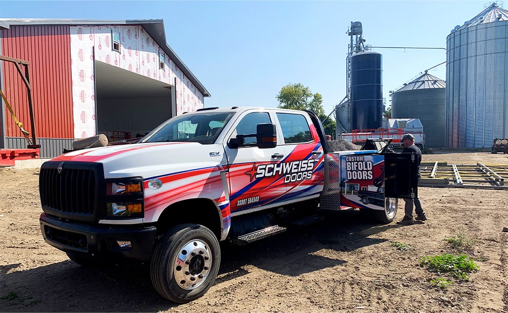 Schweiss installation truck at a job site