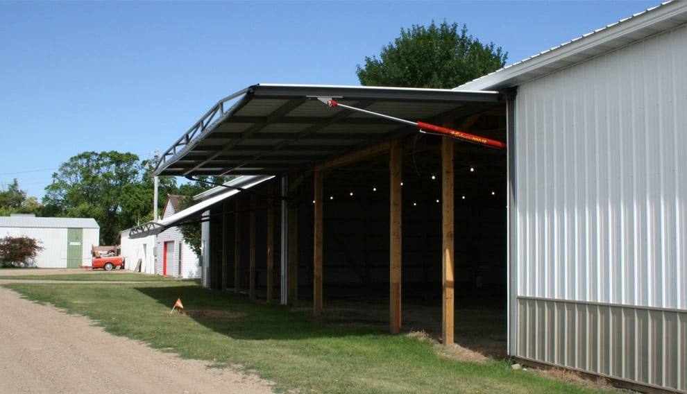 large machinery building with hydraulic doors