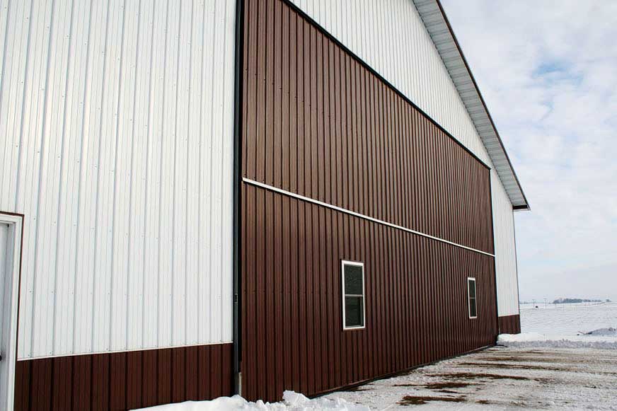 Weathertight seal to storage shed on Schweiss Bifold Door with top and bottom rubber seal 