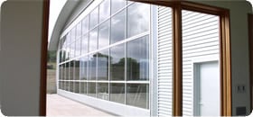 All glass covered bifold hangar door