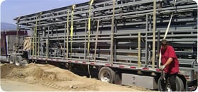 Schweiss Hydraulic doors loaded onto semi