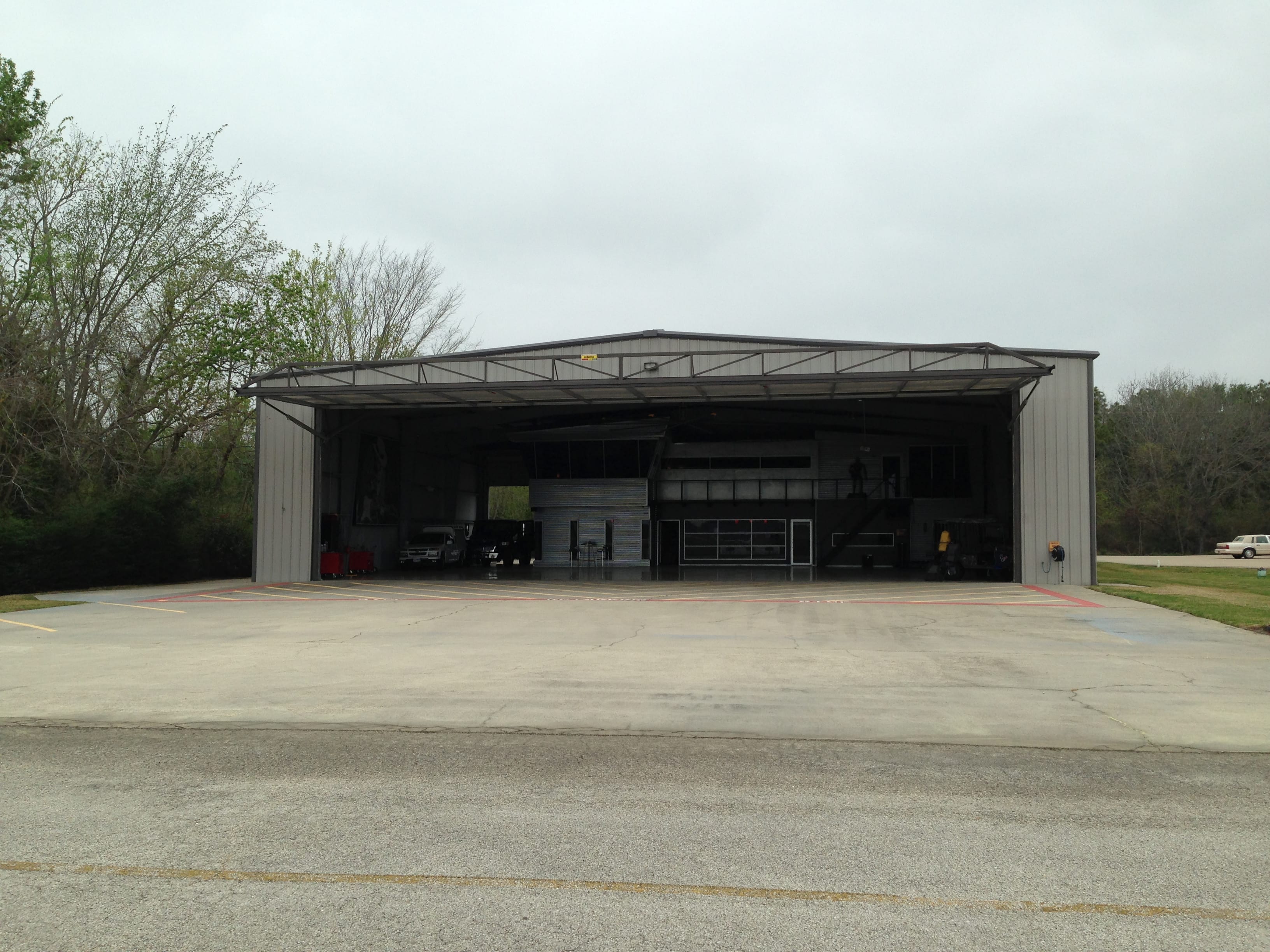 Straight on view looking into the hangar with Schweiss Hydraulic Door open