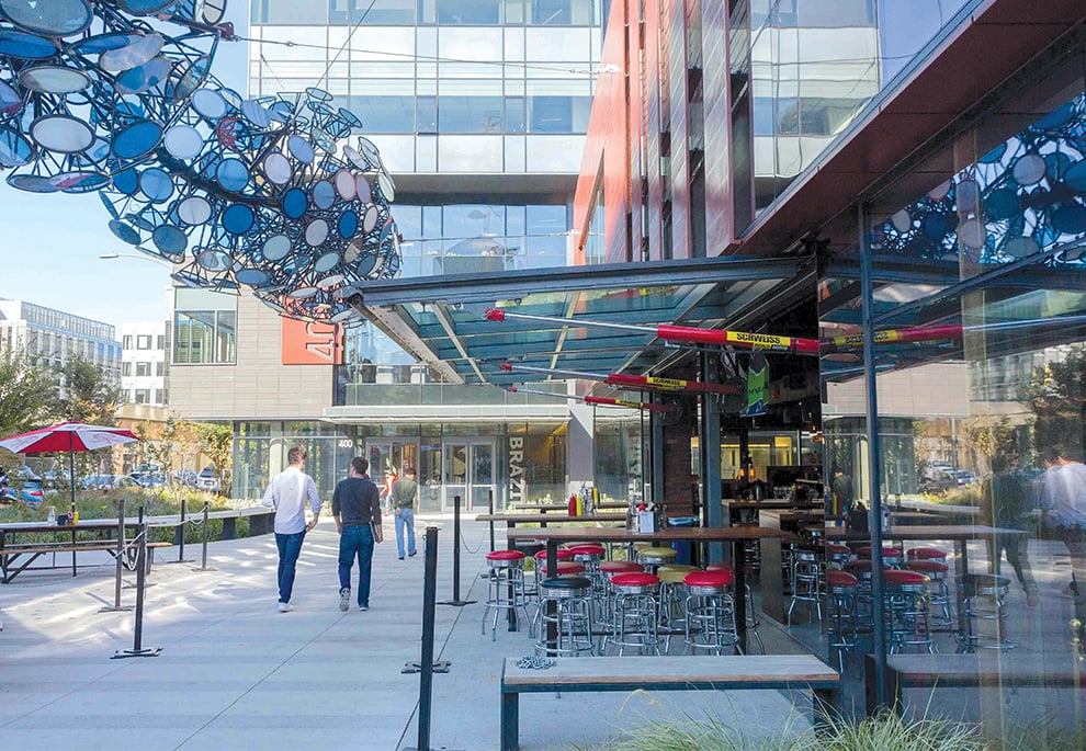 Hydraulic doors give tavern additional seating in courtyard